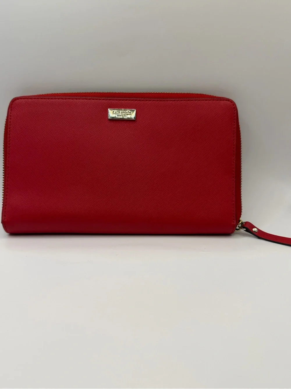 Kate Spade New York red Saffiano leather extra large zipper round wallet